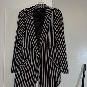 Torrid blazer. Slightly worn. Great condition like brand new no rips or tears